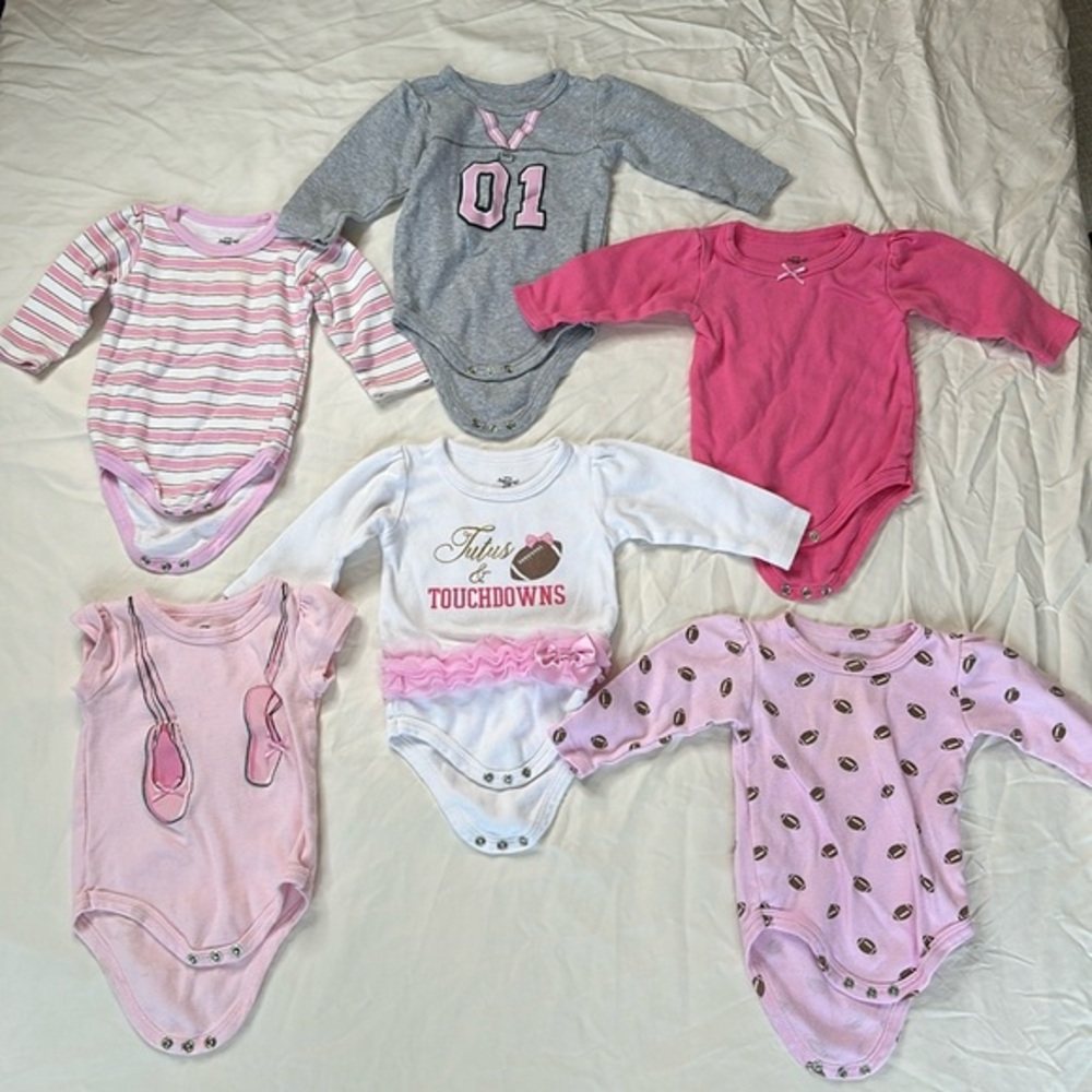 Bundle of 6 onesies. All Little Treasures brand, five long sleeve and one short